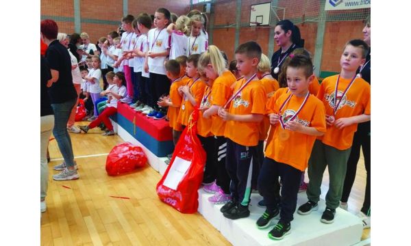 Okićeni medaljama i osmesima